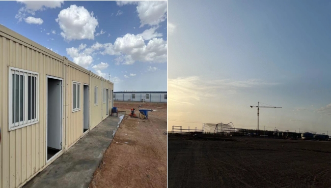 萬(wàn)頃黃沙映壯志，樓閣巍巍矗風(fēng)沙