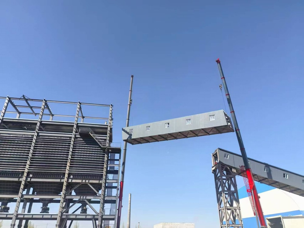 陜煤建設(shè)天工公司新疆第一項目部：雙機協(xié)作展絕技，棧橋凌空貫長虹